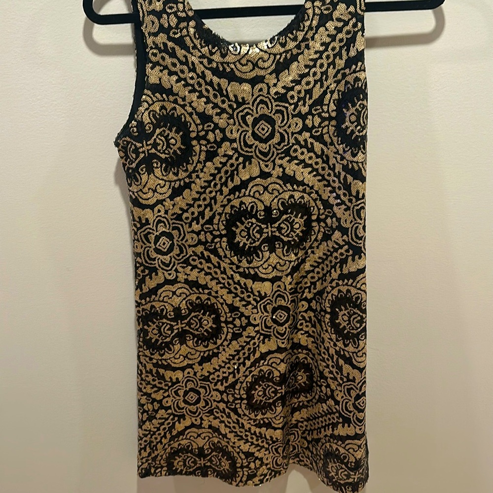 Black and gold sequin dress